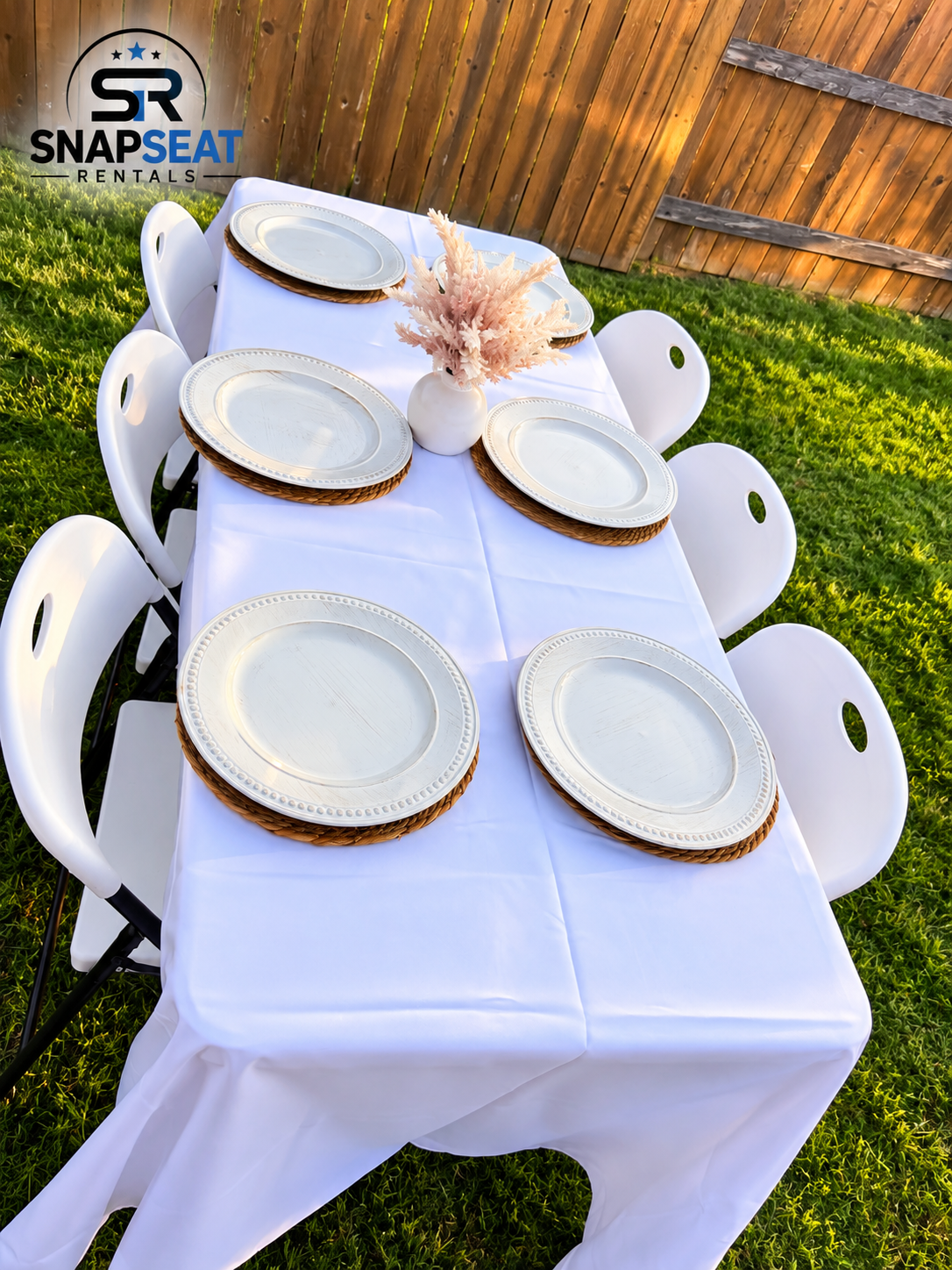 Table and eight chairs with white linen