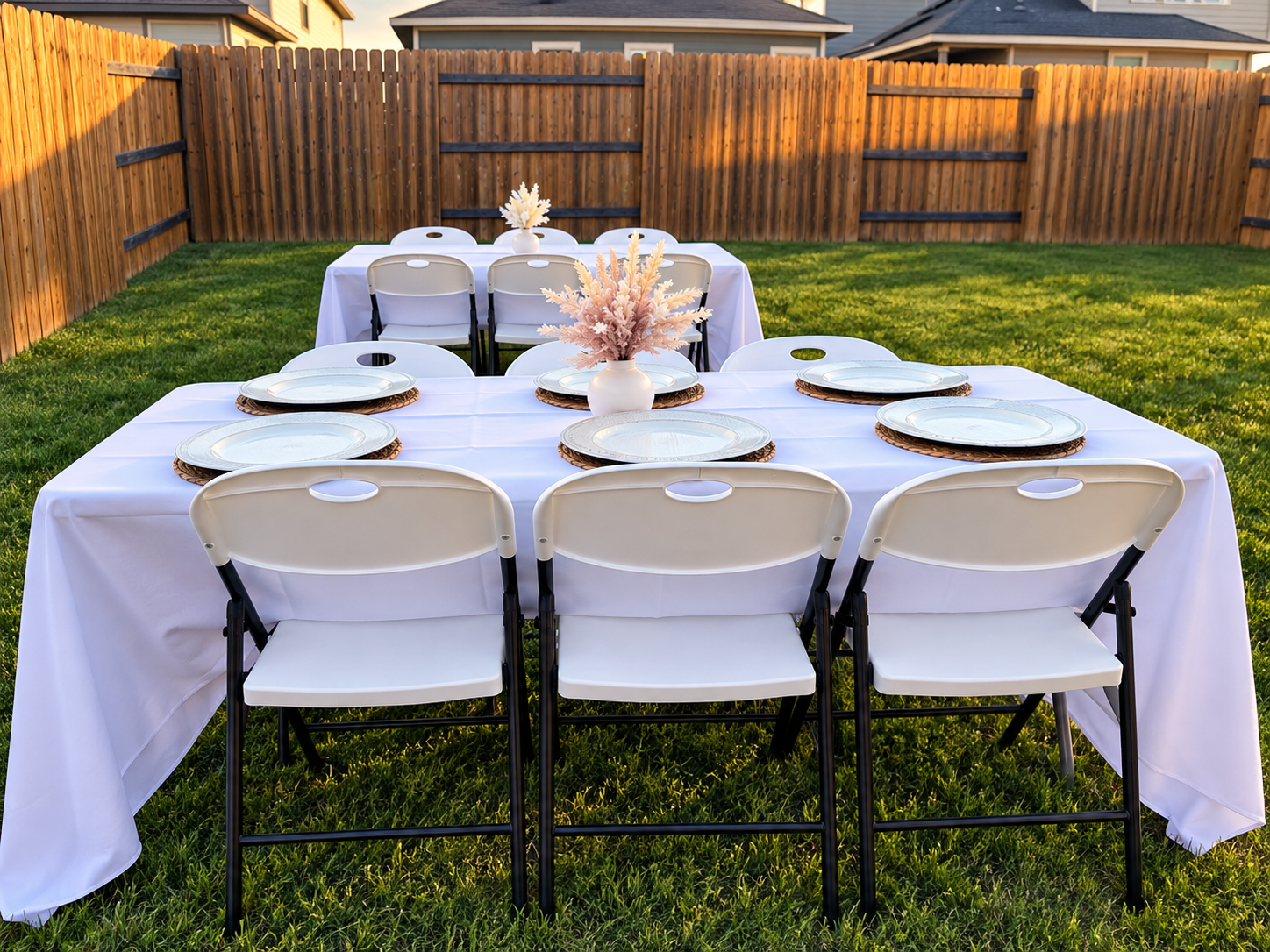 Table with eight white chairs
